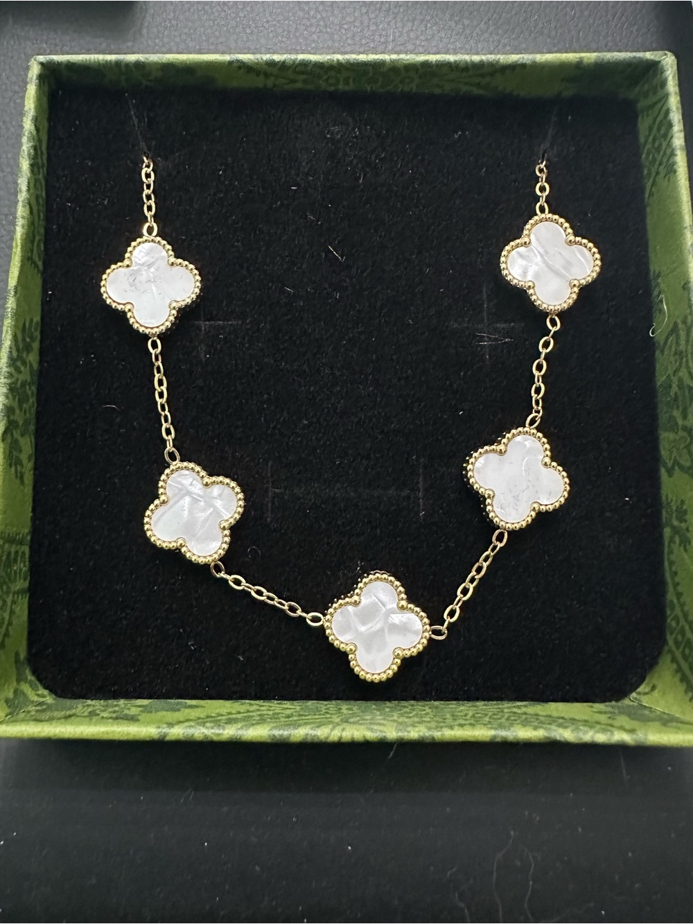 Gold Bracelet with White Mother-of-Pearl Clover Motifs